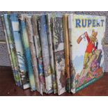 Fourteen vintage Rupert Annuals (examine)