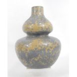 A Chinese double gourd vase with mottled glaze 27m high