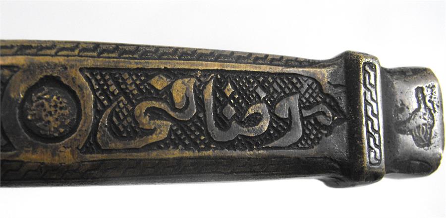 An Islamic brass scribes box, decorated flowers and script 23cm wide - Image 2 of 2
