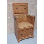 A pine metamorphic hall chair, in the form of a two drawer chest 57m wide
