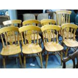 A set of ten beech country dining chairs, including two carvers (10).
