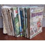 Seventeen vintage Rupert Annuals (examine)