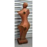 An abstract cast iron sculpture, depicting a single figure with coppered finish 76cm high