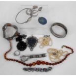 An opal set silver bangle, a filigree bracelet, a pearl necklace, and other items
