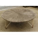 A sunburst teak and metal garden table 119cm diameter