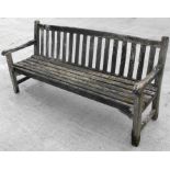 A teak garden bench 180cm wide