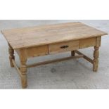 A reclaimed Victorian pine coffee table, with central single drawer, on turned legs, 120 by 70cm.