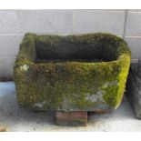 A carved stone planter or trough 83cm x 63cm