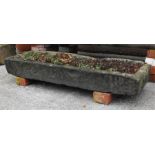 A Carved stone pencil trough 117cm x 37cm