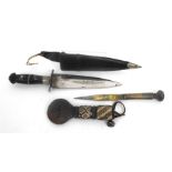 Two ethnic daggers in leather scabbards, 28cm and 21cm overall lengths (2)