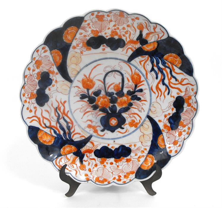 A late 19th century Japanese Imari charger decorated with flowers, 31cm diameter.