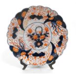 A late 19th century Japanese Imari charger decorated with flowers, 31cm diameter.