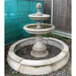 A two tier stoneware fountain and base of classical form 175cm high 210cm diameter