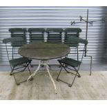 A circular garden table on iron base 93cm diameter with six folding slatted chairs, marked "Win