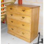 A Victorian pine chest of two short and three long graduated drawers, on plinth base, 105cm wide.