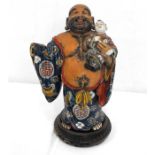 A Japanese pottery figure in the form of a man holding a child (AF) 27cm high
