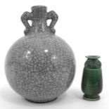 A Chinese bulbous crackle glaze two handled vase 13cm high and a miniature green glaze vase 6cm high