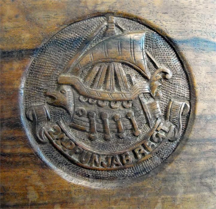 A pair of hardwood bookends, carved with the Second Punjab Regt. Crest. - Image 2 of 2