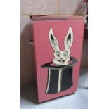 A magicians performance stand, decorated with rabbit in a hat, 46cm wide.