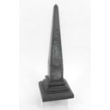 A Victorian slate obelisk with faux malachite painted decoration 34cm high