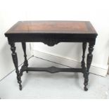 A late 19th century ebonised card table on turned legs, joined by a stretcher, 88cm wide.