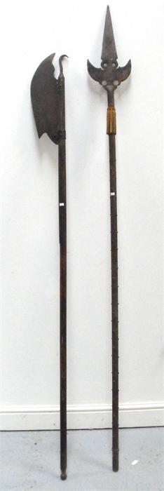 An iron halberd and another similar weapon (possibly for re-enactment), 210cm high.