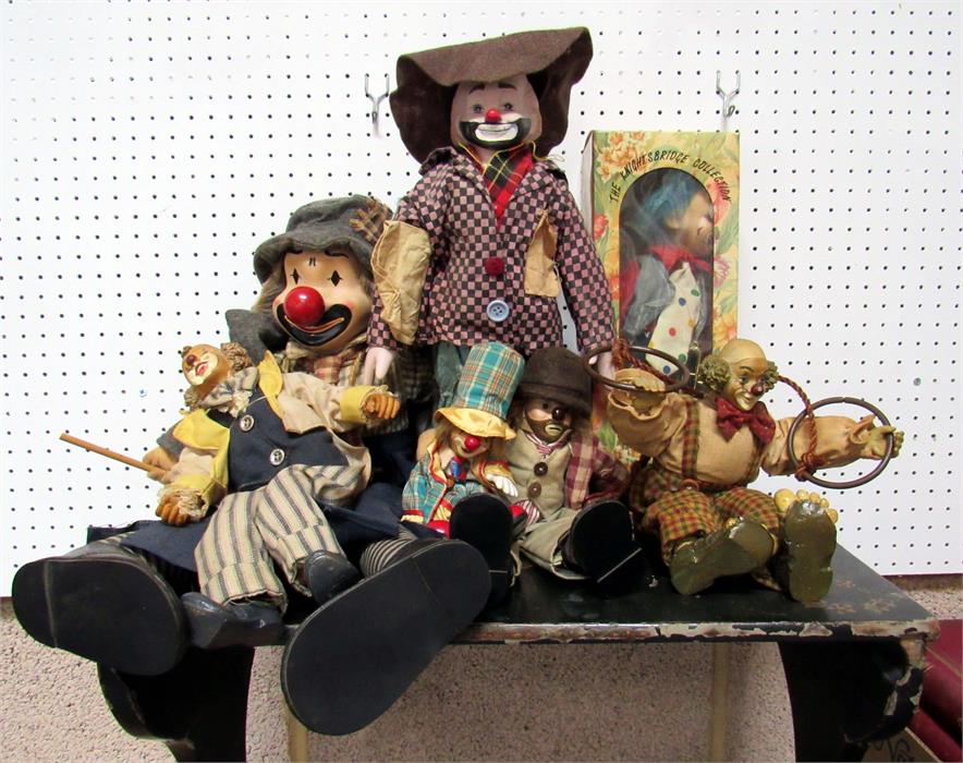 A Knightsbridge Collection porcelain clown, and other toy clowns (box).