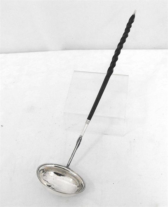 A Georgian silver toddy ladle with whale bone handle, London 1797, 33cm high