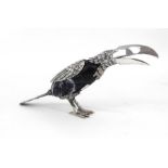 A white metal and lapis toucan (tests as silver) 10cm high