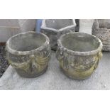 A pair of circular stoneware planters with swag decoration (2).