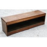 A wooden hall bench with open storage under-tier, 153cms wide.