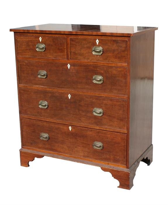 A Georgian mahogany chest of two short & three long graduated drawers, on bracket feet, 107cms
