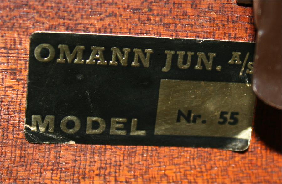 A mid 20th century Danish rosewood extending dining table, makers label Omann Jun to underside, with - Image 2 of 4