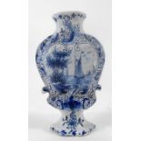 A Delft pottery vase, decorated with a sailing ship, 12cm high.