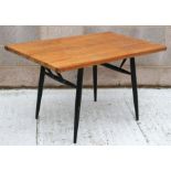 A 1960's pine topped kitchen table, 120 by 701cms. Condition Report Loss of one support to