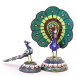 An Indian silver & enamel gem set peacock, 14cm high; and another similar (2).