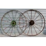 A large pair of spoked cart wheels, 108cms diameter (2).