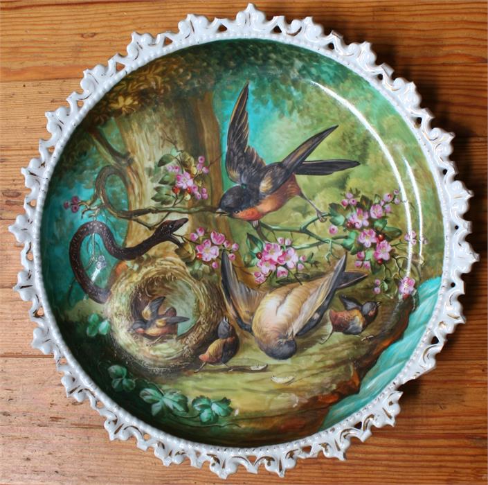 A Victorian Continental plate, hand painted with birds, chicks and a snake, 25cms. diameter; and - Image 3 of 4