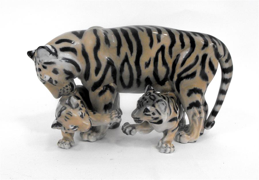 A Royal Copenhagen porcelain tiger and cubs group, No. 4687 26m x 14cm high (factory second quality)