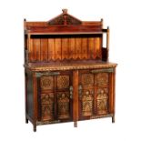 An oak Gothic Revival side cabinet in the manner of Charles Bevan, galleried superstructure