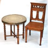 An oak Art Nouveau hall chair, and a circular brass occasional table on barley twist supports (2).
