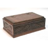 An 18th / 19th century oak bible box, with carved decoration, 50 by 32cms.
