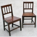 A pair of country oak & elm hall chairs (2).