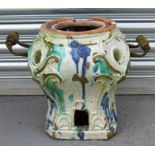 An early 18thC glazed pottery coach warmer (AF) 36cm high