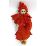 A bisque headed doll, 39cms high (a/f). Condition Report Cracks to back of head and face, no