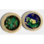 A pair of Wedgwood majolica ribbon edge plates with aesthetic scenes of a Dragonfly & Lily Pond