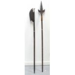 An iron halberd and another similar weapon (possibly for re-enactment), 210cm high.