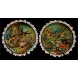 A Victorian Continental plate, hand painted with birds, chicks and a snake, 25cms. diameter; and