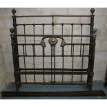 A brass & iron double bed frame, 138cms wide.