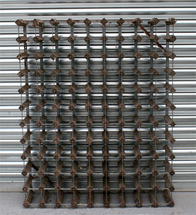 A large wood & metal wine rack, 91cm wide.